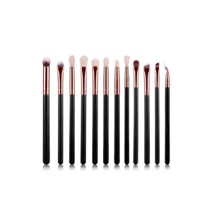 12-piece eye makeup brush set detail, black handle and rose gold ferrule for precise application.
