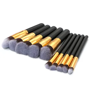 Ensemble de 10 pinceaux de maquillage professionnels avec manches noirs et poils doux.