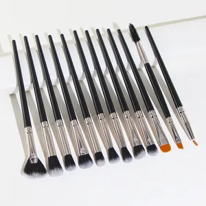 Detailed view of black handle makeup brushes set with soft bristles and metallic ferrules.