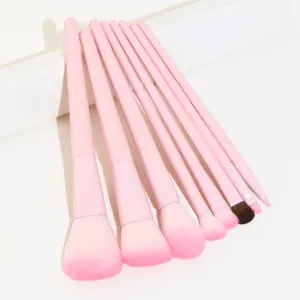 Detailed view of pink makeup brush bristles and soft gradient fibers for delicate application.