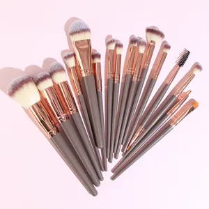 Professional 16-piece makeup brush set with rose gold ferrules and soft gradient bristles.