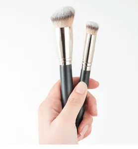 Professional angled makeup brush set with soft dense bristles for smooth face foundation.