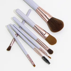 7pcs light purple makeup brush set with rose gold ferrules for professional travel use.