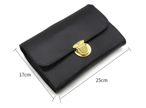 Professional black leather makeup brush storage bag featuring a secure gold tone lock buckle.