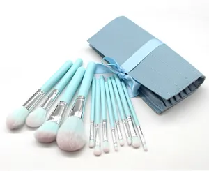 Detailed view of the 12-piece light blue makeup brush set with matching storage pouch.