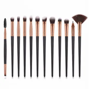 Professional 12-piece makeup brush set featuring black handles and soft synthetic bristles.