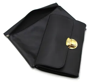 Detailed view of black PU leather makeup brush storage bags set with golden metal lock.