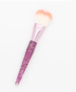 Heart-shaped makeup blush brush with glitter pink handle for professional face powder.