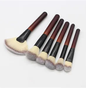 Professional makeup brush set with wooden handle and soft synthetic bristles for flawless application.