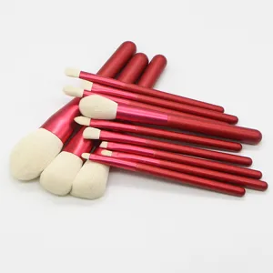 12-piece professional makeup brush set with red handles and soft white bristles for daily use.