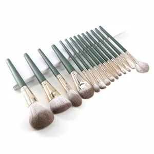 14pcs professional makeup brush set with soft hair green wooden handles and gold ferrules.