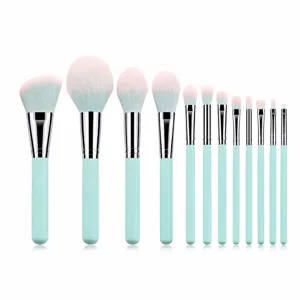 12pcs professional makeup brush set with light blue wooden handles and soft gradient bristles.