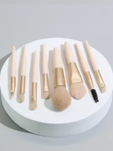Mini makeup brush set detail, soft bristles and lightweight handle for precise application.