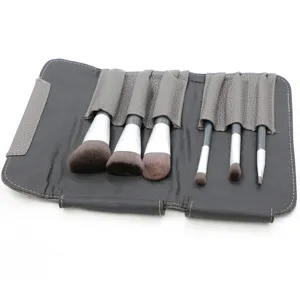 Professional 6-piece makeup brush set with grey PU leather roll bag for flawless contouring.
