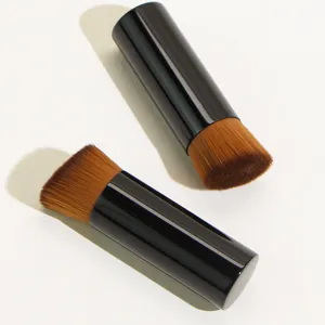 Close-up detail view of the angled makeup brush bristles, showing dense soft synthetic hair.