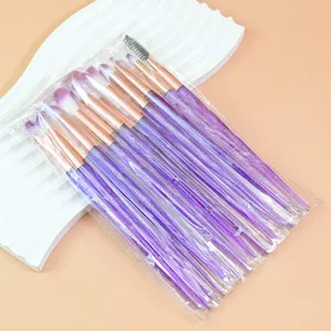 20 pcs crystal glitter eyeshadow brush set with purple handle and cosmetic bag packaging.