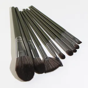 Professional 9-piece makeup brush set with dark green handles, soft bristles, for face and eyes.