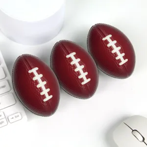 Close-up detail shot of brown PU foam rugby stress relief balls, soft texture and clear stitches.
