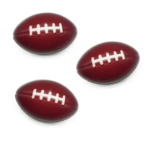 Close-up of brown PU foam football stress relief grip toy, detailed texture display.