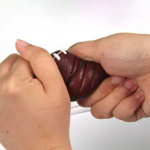 Close up view of brown football shaped PU foam stress relief squeeze ball toy flexibility.