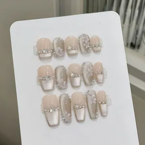 Uñas postizas hechas a mano nude ojo de gato mariposa cristal floral manicura chic