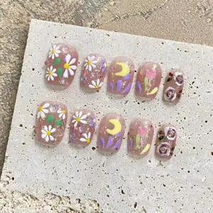 Collection printemps été faux ongles avec motifs de fleurs mignonnes et lune pour femmes.