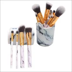 10-piece marble makeup brush set with PU leather holder portable professional cosmetic tools.