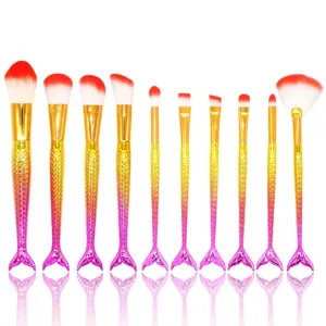 Set de 10 brochas de maquillaje de sirena con mangos degradados para rostro y ojos.