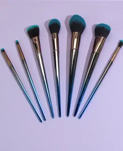 Detailed view of 7-piece makeup brush set with gradient blue handles and soft bristles.