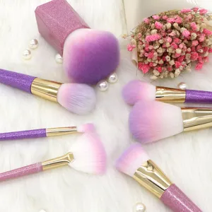 Professional 7-piece purple gradient makeup brush set with soft synthetic fibers and glitter handle.