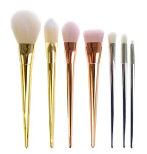 Detail shot of 7pcs makeup brush set with metallic handles for face and eye cosmetic use.