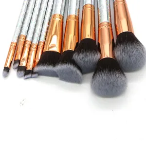 10pcs professional makeup brush set with glitter handles and soft synthetic bristles for beauty.