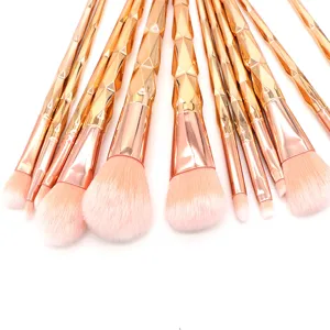 Professional diamond handle makeup brush set with soft pink bristles for face and eye makeup.