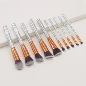 10-piece makeup brush set with holographic silver handles and soft bicolored bristles.