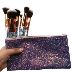 Detailed view of the 10-piece glitter makeup brush set with a matching sparkly cosmetic pouch.