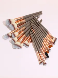 20Pcs brown makeup brush set with soft synthetic hair for powder, eyeshadow and facial contouring.