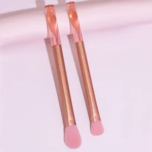 2pcs pink liquid glitter makeup brushes set, soft cosmetic tools for eye shadow and face.