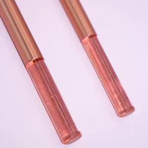 Pink makeup brushes detail view featuring rose gold metal ferrule and glitter crystal handle.