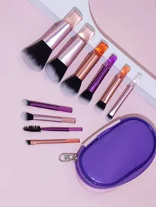 Mini makeup brush set detail view, soft bristles and purple travel case for easy touch-ups.