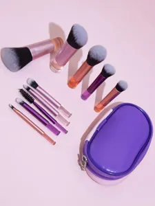 10-piece mini makeup brush set detail view showing various cosmetic brushes and purple storage bag