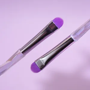 Detail view of purple bristle eye shadow makeup brushes with crystal handle, soft and smooth.