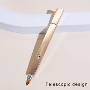 Detail view of the elegant golden telescopic lip brush with crystal detail for makeup.