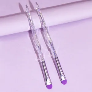 Set of 2 crystal handle makeup brushes for precise eyeshadow application and blending beauty look.