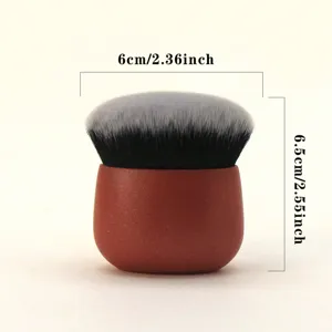 Portable soft foundation brush with dense mushroom head for professional daily makeup.