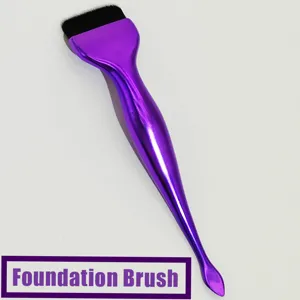 Detailed view of the purple flat foundation brush with smooth handle and soft bristles.