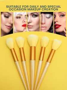 Professional 5-piece makeup brush set with soft yellow bristles for flawless face makeup.
