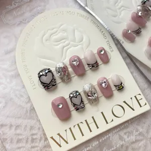 Handgefertigtes künstliches Nagelset mit Herz-Strasssteinen und Cat-Eye-Glitzer-Design