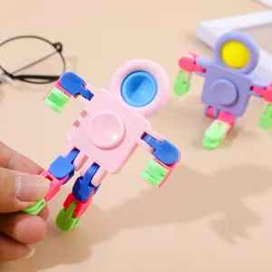 Detail view of the colorful astronaut fidget toy, featuring movable joints and pop bubbles.
