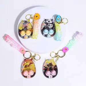Cute Halloween water game keychain, funny cartoon ring toss toy pendant with silicone strap.