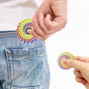 Mini fidget spinner coloré anti-stress, design portable pour se détendre partout.